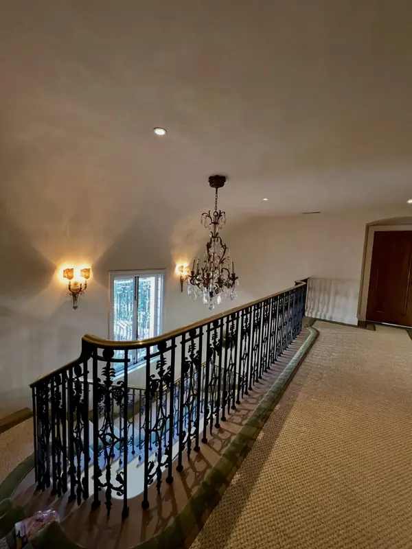 Finished Venetian plaster ceiling over the upstairs landing of a Spanish-style home in The Avenues, Salt Lake City, Utah